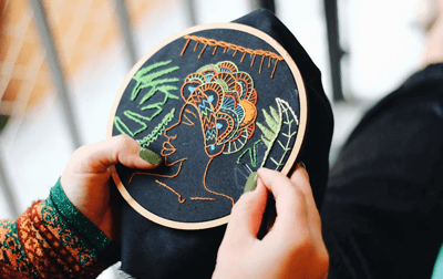 Hand embroidery on a dark garment